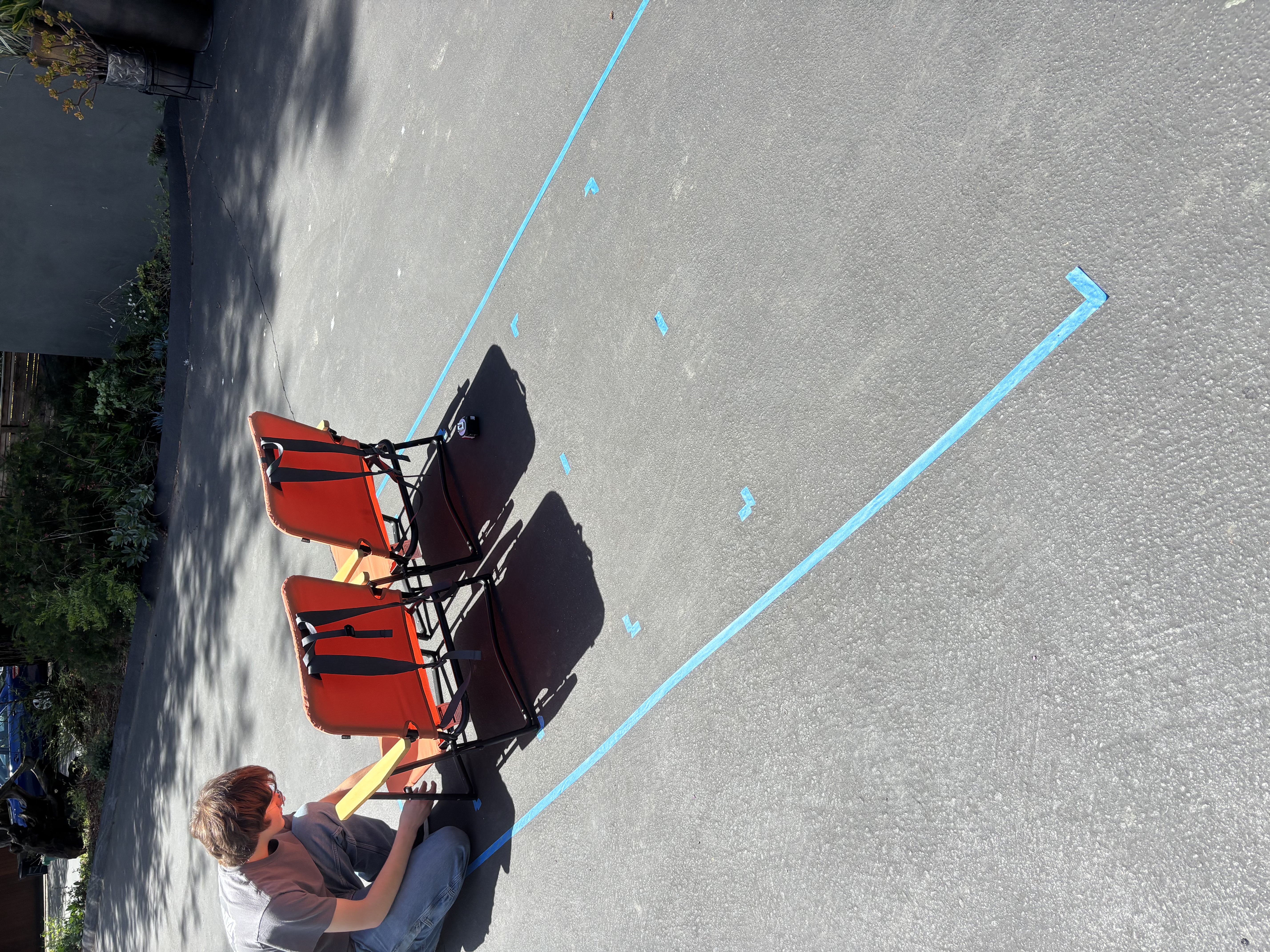 Laying out the railcart seats and frame footprint in the driveway